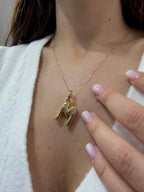 Collana in oro 18kt con ciondolo con iniziale