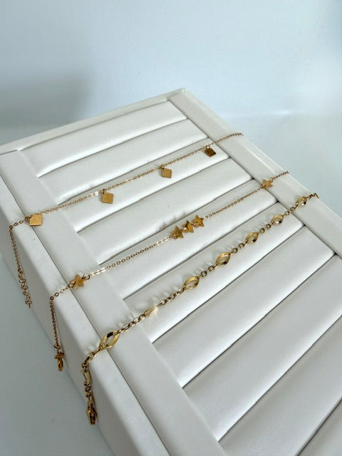 Bracciali in Oro 18kt con Ciondoli
