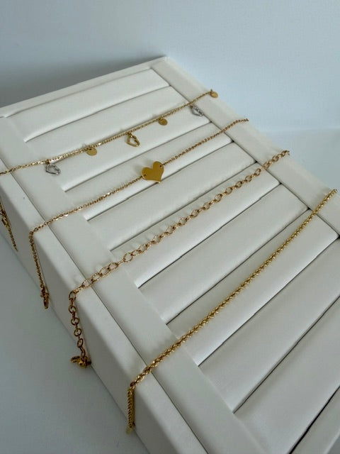 Bracciali in Oro 18kt con Ciondoli Cuore e Dettagli Minimal
